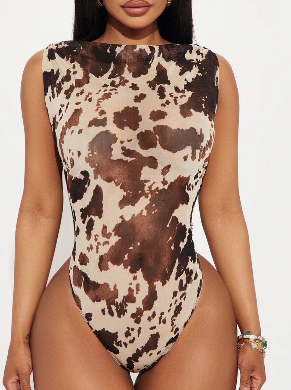 Fashion Nova Brown and Cream Cow Print One-Piece Bodysuit